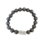 Lava Bracelet with Star Agate and 8mm Lava Stones
This elegant bracelet highlights the celestial allure of Star Agate paired with the raw, volcanic texture of 8mm lava stones. Thoughtfully designed and meticulously handcrafted in Iceland by Hildur Bolladóttir. 