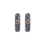 Experience the beauty of Icelandic lava with our LAVA - Titan Huggie earrings. Made of titanium and 9k Rose Gold with a stunning 2x1.5mm Peridot stone, these earrings feature a hand-engraved texture that is oxidized and polished to perfection. With dimensions of 15.5mm in height and 4mm in width, with an inner dimension of 7.5mm, these earrings offer a unique and elegant look that will enhance any outfit. Ófeigur gullsmiðja - ofeigur.is