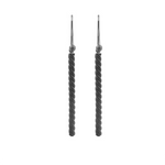 Dangling earrings by Zeezen, crafted from twisted titanium. A sandblasted, oxidized surface contrasts beautifully with naturally polished details, creating a refined and distinctive finish.
