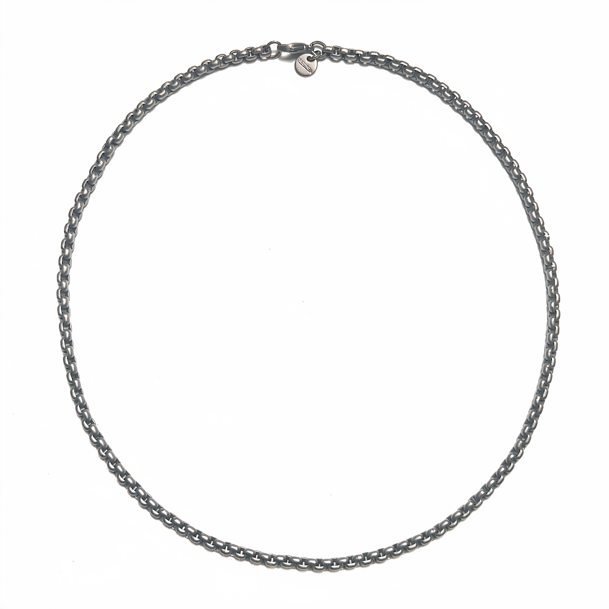 A matte titanium necklace featuring a 2.7 mm Venetian chain and a lobster clasp. Clean lines and a matte finish give the necklace a refined, timeless look. Ófeigur gullsmiðja